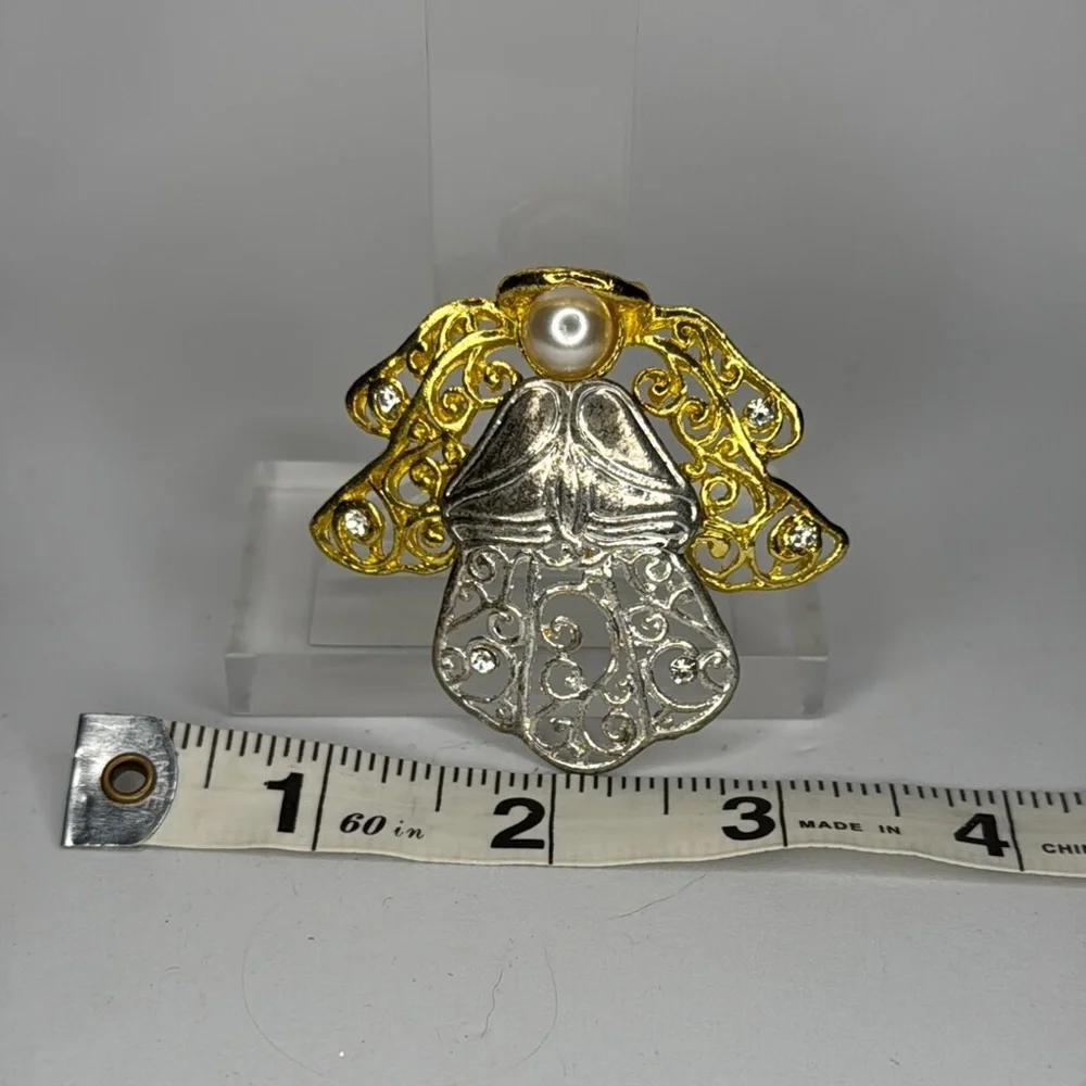 Elegant Gold and Silver Angel Brooch with Intricate Filigree
